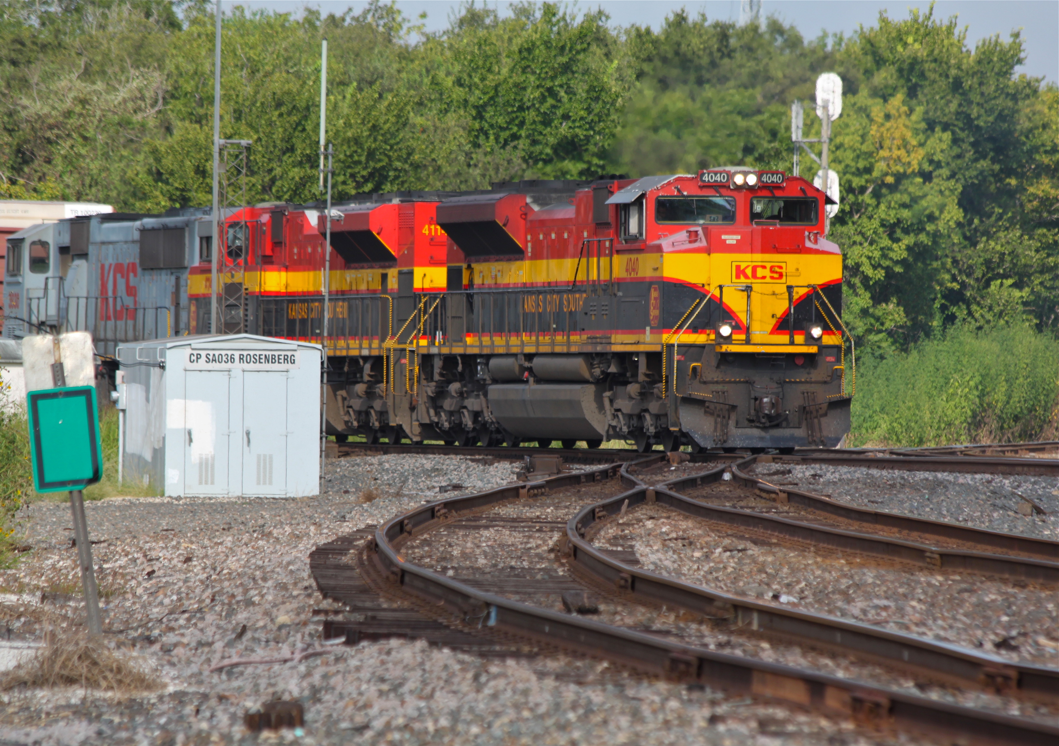 Eastbound KCS manifest rolls into Rosenberg Junction TX