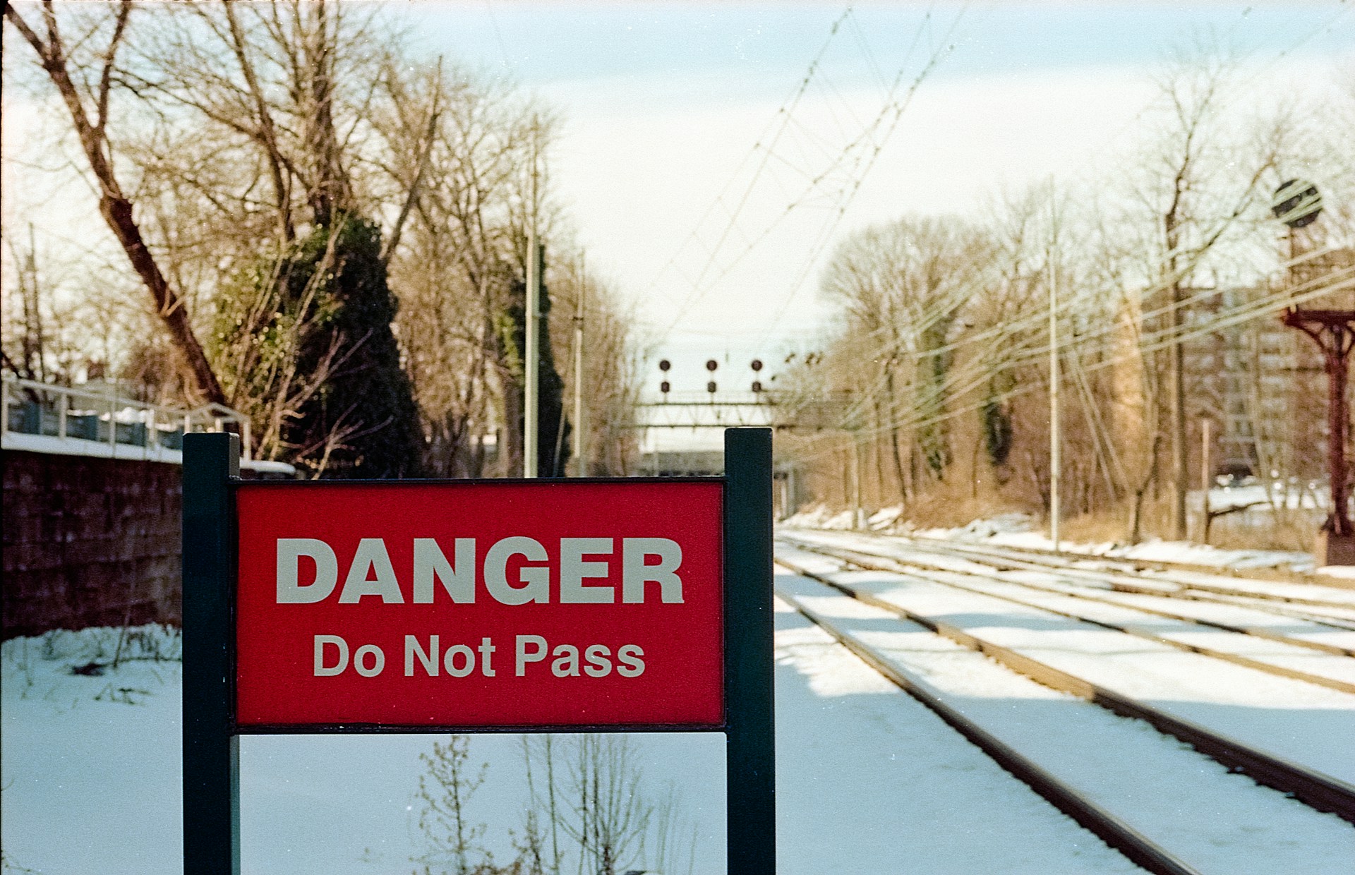 No trespassing sign near train tracks